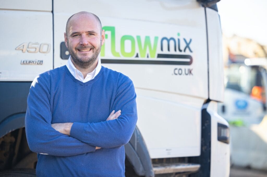 Paul standing in front of flowmix van
